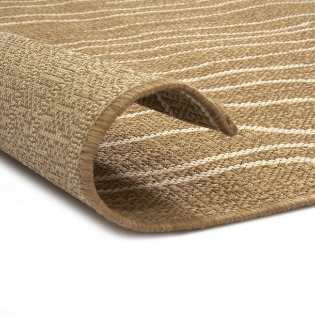 Close-up of a beige woven rug with white stripes on a white background