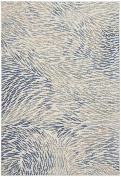 Rug with wavy pattern in blue and beige tones