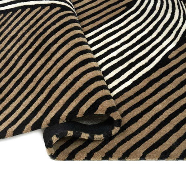 Close-up of black and beige striped rug