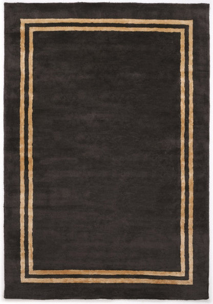 Black rug with a beige border on a white background