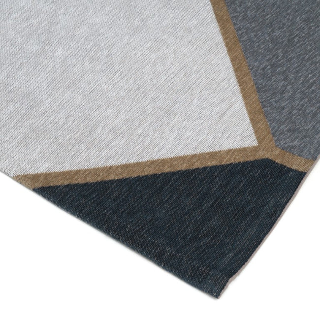 Close-up of a textured fabric with geometric pattern on a white background