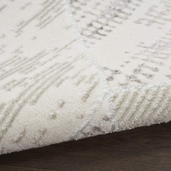 Close-up of a textured beige and brown area rug