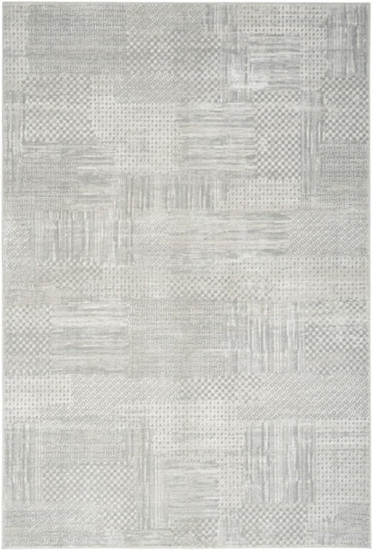 Textured gray area rug with geometric pattern
