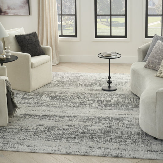 The Harmony Abstract Rug Collection by Nourison in a stylish living room setting with soft tones