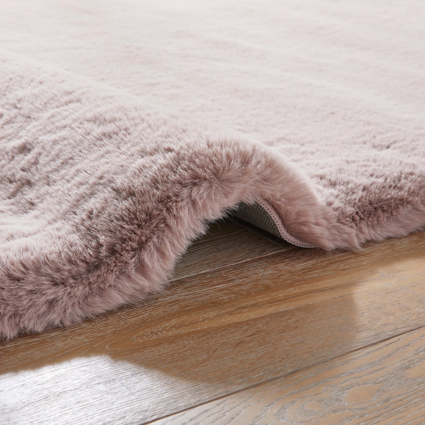 Soft pink luxury Heavenly Rug Collection with a plush texture ideal for elegant home decor