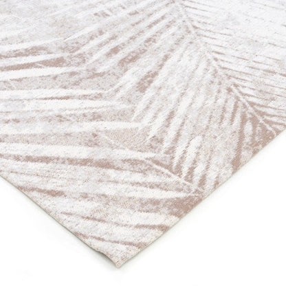 Textured rug with leaf pattern on a white background