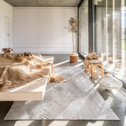 Modern interior with concrete ceiling, large windows, and minimal decor.