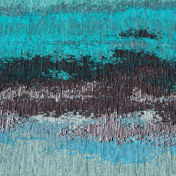 Close-up of a textured fabric with blue and black patterns