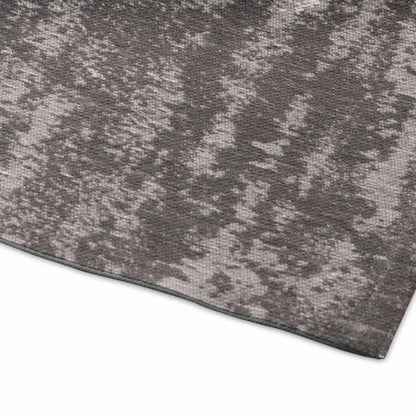 Close-up of a textured gray rug on a white background