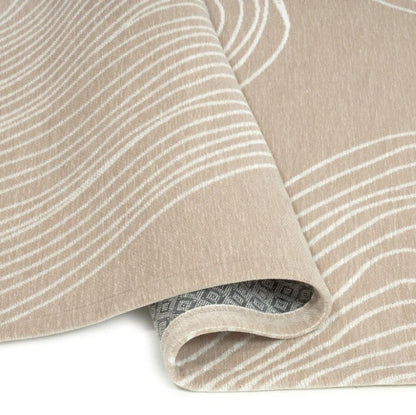 Beige fabric with white wavy lines on a beige background