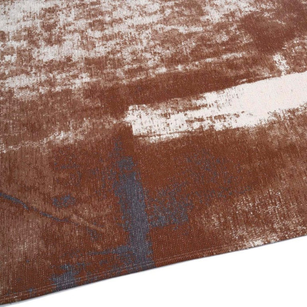 Close-up of a textured brown and white rug