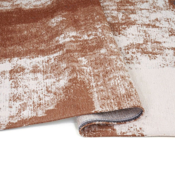 Textured brown and white rug on a white background