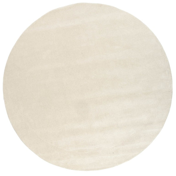 Round beige rug on a white background