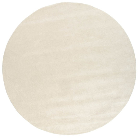 Round beige rug on a white background