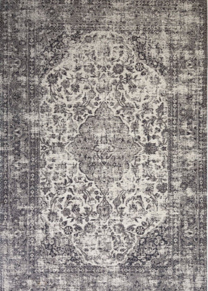 Decorative rug with intricate pattern on a grey background