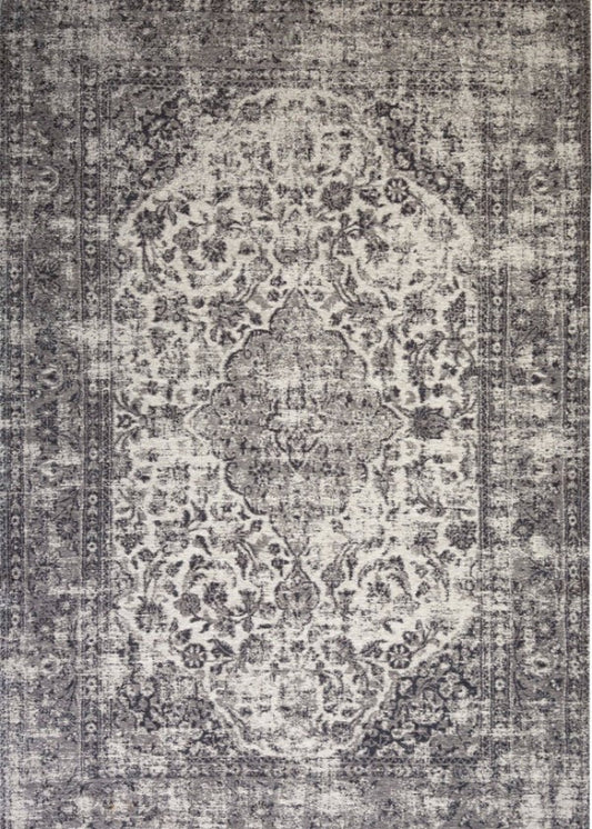 Decorative rug with intricate pattern on a grey background