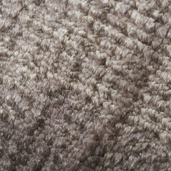 Close-up of textured brown carpet