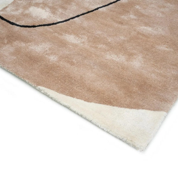Luxury rug by Carpet Décor featuring a soft beige texture with subtle patterns for elegant home decor