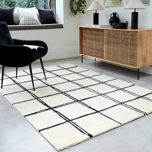 Asiatic Albany geometric rug UK in white with black grid lines in modern living room
