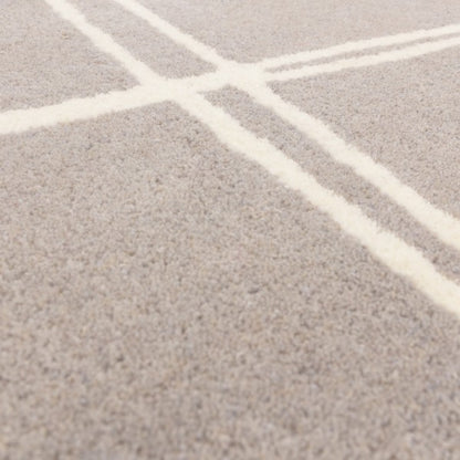 Close-up of Asiatic Albany geometric rug UK featuring luxury soft textured pile with intersecting white lines
