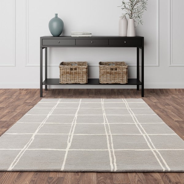 Asiatic luxury Albany geometric rug UK in neutral tones with white grid pattern on wooden floor