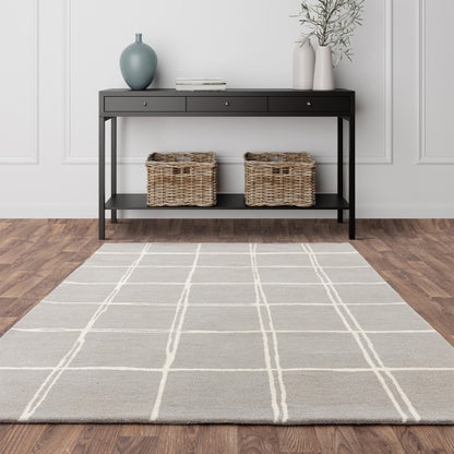 Asiatic luxury Albany geometric rug UK in neutral tones with white grid pattern on wooden floor