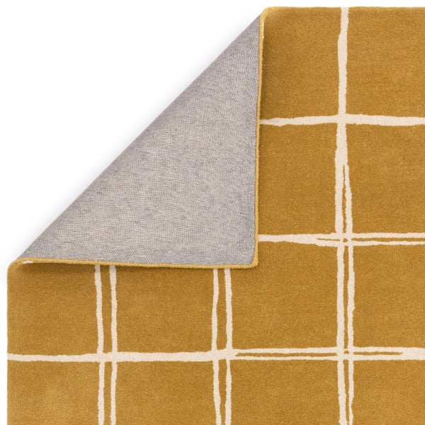 Luxury Asiatic Albany geometric rug UK in mustard yellow with cream grid pattern and corner folded