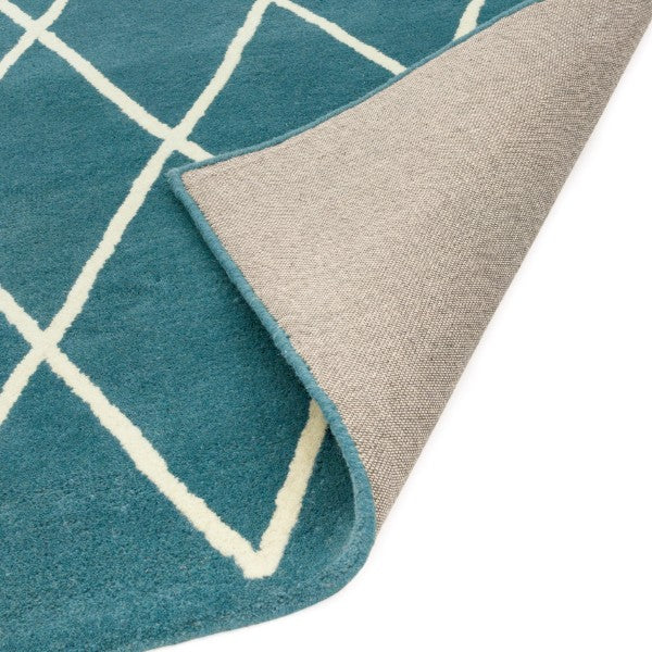 Asiatic luxury Albany geometric rug UK in blue with white intersecting lines and woven backing detail