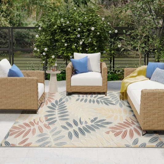 Nourison Aloha Range of Outdoor Rugs featuring vibrant leaf patterns for patio or garden decor