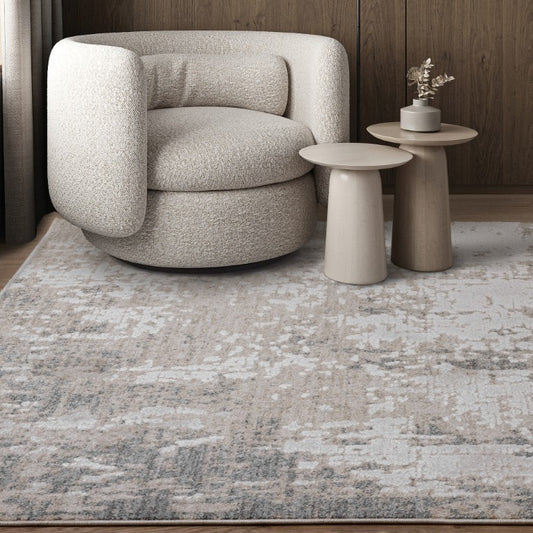 Asiatic Anders Lustrous Tranquil Rugs in a stylish living room setting with a modern chair and tables