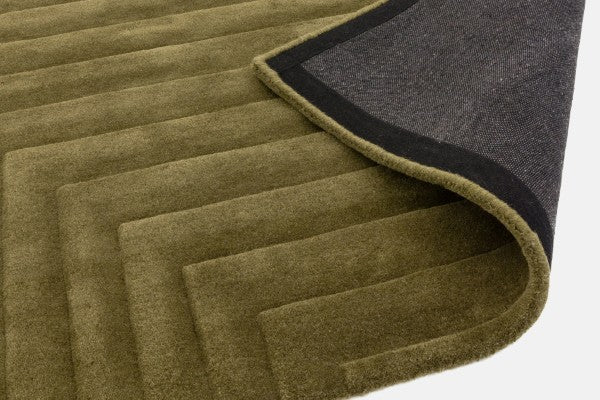 Close-up of Asiatic Contemporary Plains Rug in green showing textured geometric pattern and edge detail