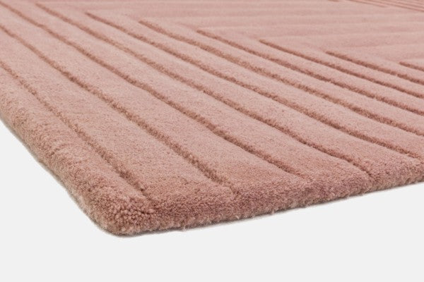 Asiatic Contemporary Plains Rug in soft pink with textured linear pattern and plush pile close-up