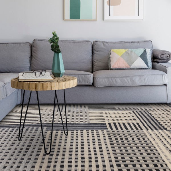 Aspect Contemporary Designer Rug by Asiatic with geometric patterns in a modern living room setting