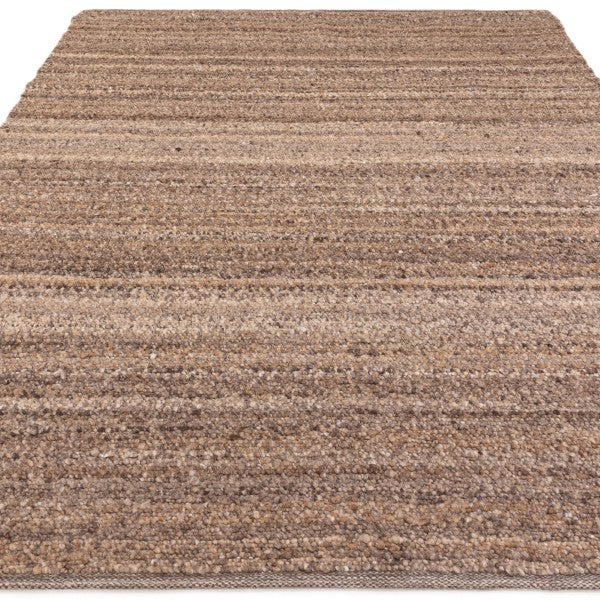 Asiatic luxury Boho Abbus Rug in earthy brown tones with textured woven design