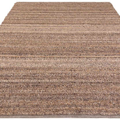Asiatic luxury Boho Abbus Rug in earthy brown tones with textured woven design
