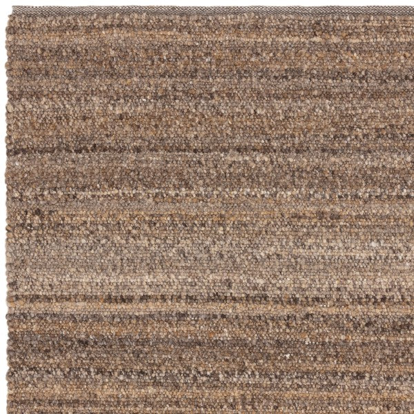 Asiatic luxury Boho Abbus Rug with textured natural earthy brown tones and woven design
