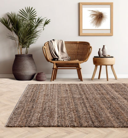 Asiatic Boho Abbus Rug luxury textured brown rug in a cosy modern living room setting