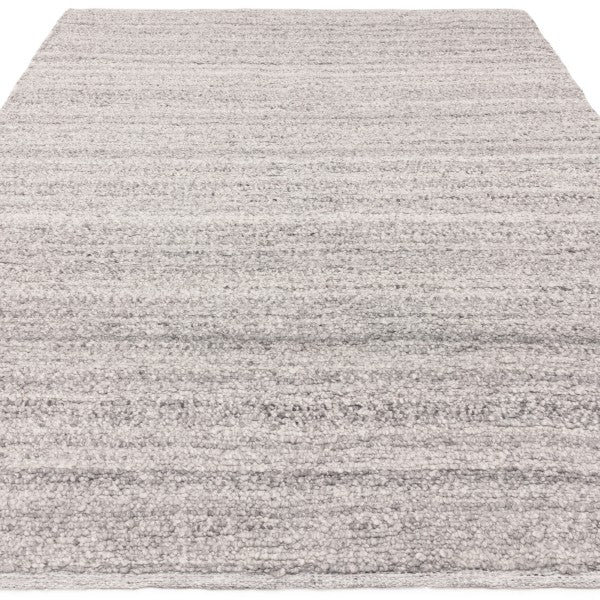 Asiatic luxury Boho Abbus Rug in soft grey tones with textured woven design