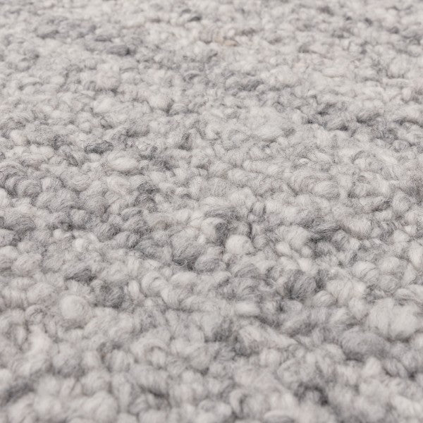 Close-up of Asiatic Boho Abbus Rug showing soft textured fibres in grey and white tones