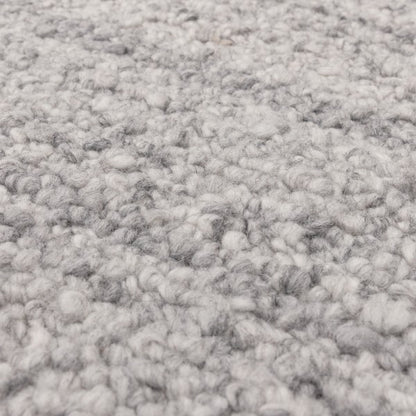 Close-up of Asiatic Boho Abbus Rug showing soft textured fibres in grey and white tones