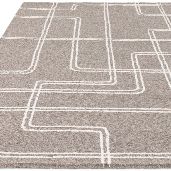 Asiatic luxury rug from the Boho Collection Ada Rug with beige base and white geometric line pattern