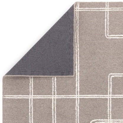 Luxury beige and white Boho Collection Ada Rug by Asiatic with geometric pattern and corner folded