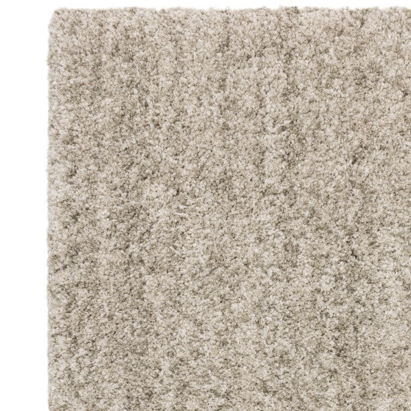 Close-up of luxury Asiatic Boho Collection Barnaby Rug showing soft textured beige fibres