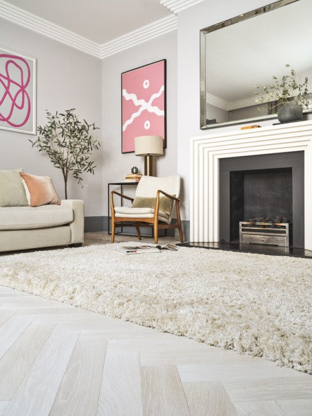 Luxury Boho Collection Barnaby Rug by Asiatic in bright living room with fireplace and modern decor