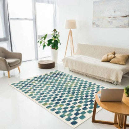 Living room with a patterned rug, beige sofa, and wooden coffee table.