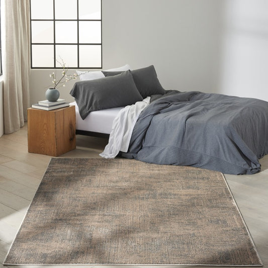 Stylish Nourison Calvin Klein Irradiant Rug Collection in a modern bedroom setting with grey bedding