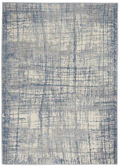 Nourison Luxury Rug from The Calvin Klein Rush Rug Collection in Blue and Cream Abstract Design