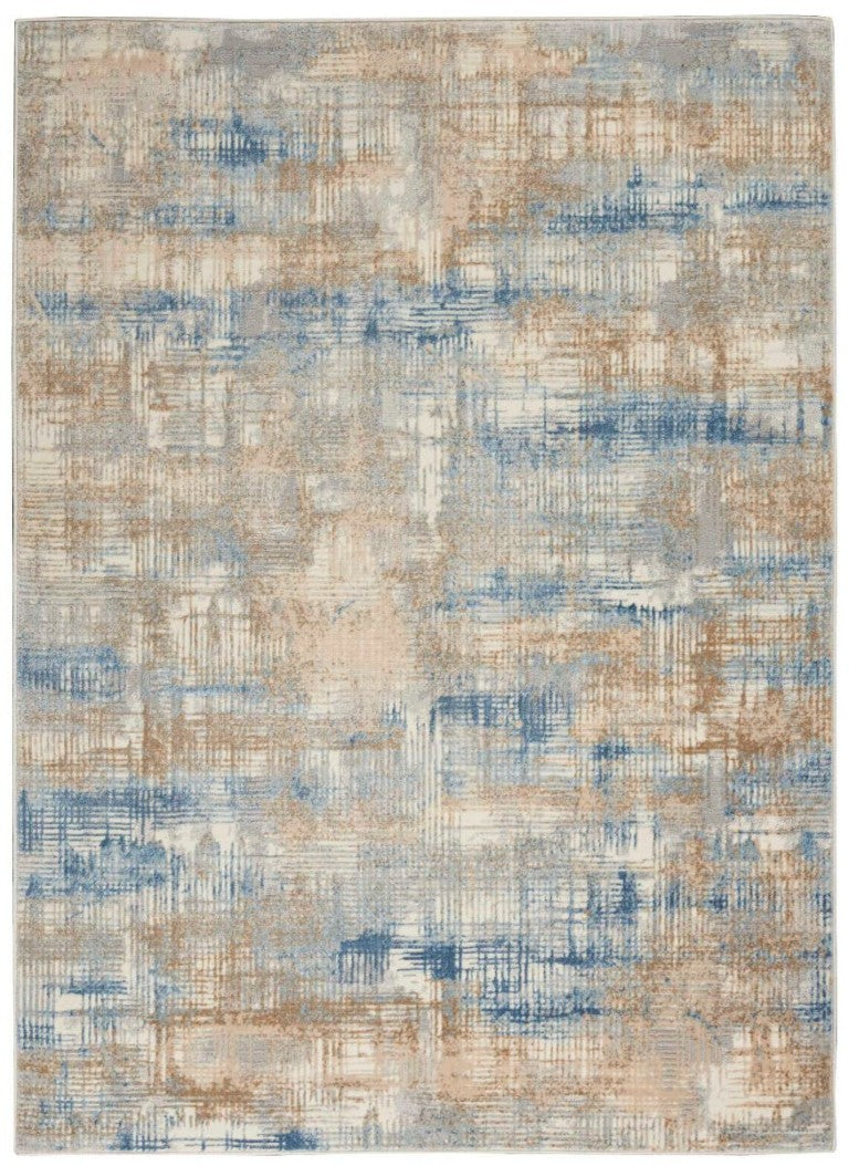 Luxury Nourison rug from The Calvin Klein Rush Rug Collection featuring a textured blue and beige pattern