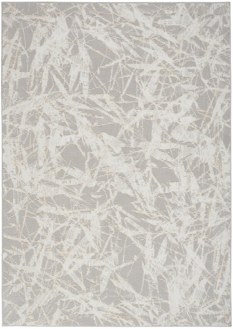 The Calvin Klein Rush Rug Collection in light grey with abstract pattern for luxury home decor
