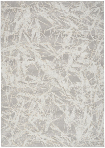 The Calvin Klein Rush Rug Collection in light grey with abstract pattern for luxury home decor